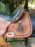 14.5 inch used Pro Rider Saddle, crystal lined skirt, tassels