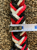 Extra thick and knotted, tri color of red, black and white barrel racing rein with snaps on the ends