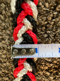 Extra thick and knotted, tri color of red, black and white barrel racing rein with snaps on the ends